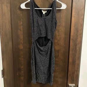 Black shiny mini dress with front cutout